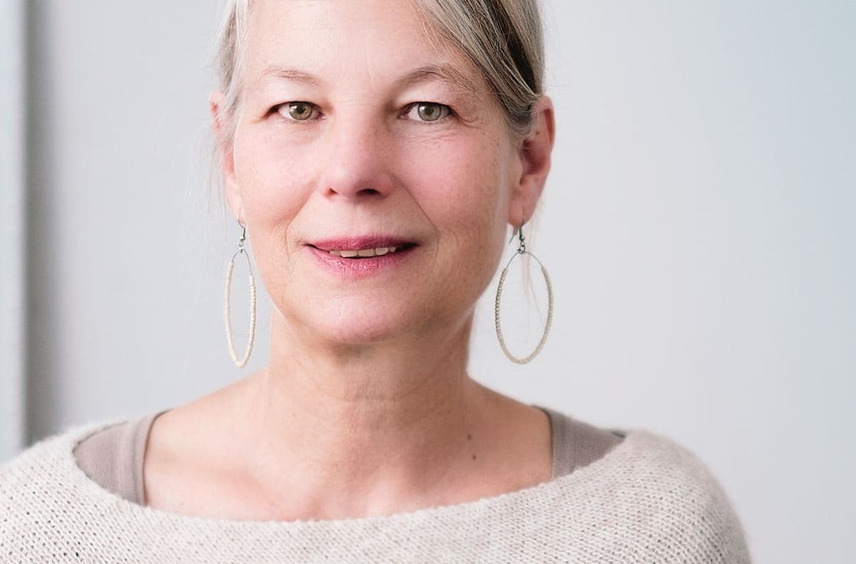 Thoughtful woman in soft light, representing depression counseling in Omaha